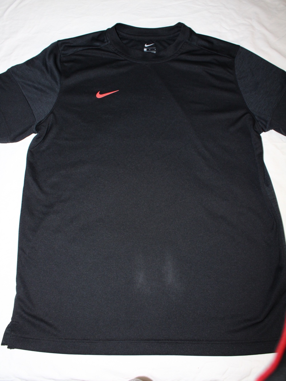 Nike Black Short-Sleeve Polo with Pink Swoosh